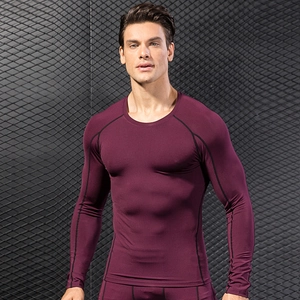 Men's compression long sleeve top and pants set in deep wine red for gym training