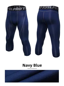 Macro detail of navy blue high-stretch quick-dry fabric and elastic waistband on pro men's leggings
