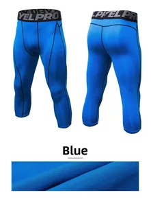 Detail view of blue compression leggings showing quick-dry fabric and elastic waistband