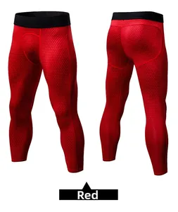 Close-up of red 3D honeycomb compression pants featuring ergonomic seams and elastic waist