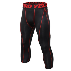 Men's Pro compression pants in black with red stitching for gym and running workouts