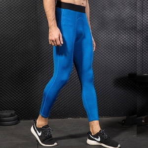 Men's blue compression capri pants with honeycomb texture for pro fitness and running