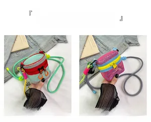 Detailed view of mini mesh crossbody pouches in pink and green with durable zippers