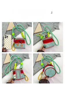 Detailed macro view of the mini cylinder mesh crossbody bag with neon green rope strap