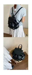 Detail view of large capacity black soft PU leather backpack with drawstring closure