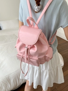 Pink PU leather preppy style backpack with drawstring closure and multiple pockets