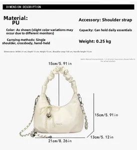 Detailed dimensions of the cream ruched crossbody bag with pearl heart charm and strap