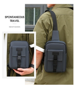 Close-up of waterproof dark grey chest bag with buckle detail and crossbody strap