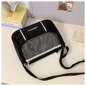 Detail of canvas messenger bag with transparent lace PVC window and star print