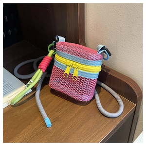 Mini mesh crossbody bag in vibrant rose mesh with colorful zippers and rope strap