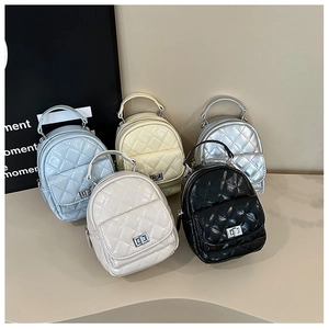 Quilted mini backpacks in five colors featuring metallic finish and silver twist locks