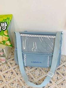 Light blue canvas messenger ita bag with transparent PVC window and lace trim detailing
