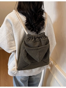 Plaid drawstring shoulder bucket bag featuring vintage knit texture and large capacity
