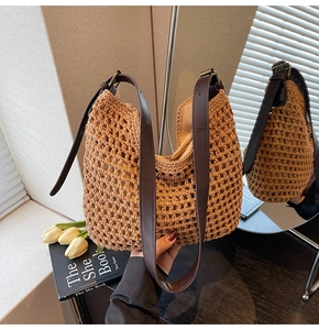 Detail of hand-woven cotton mesh bag with adjustable brown leather strap and inner lining