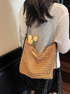 Handwoven cotton knit tote bag in light beige for summer beach vacations and daily commute