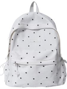 Stylish white backpack with small black floral pattern and large capacity for travel