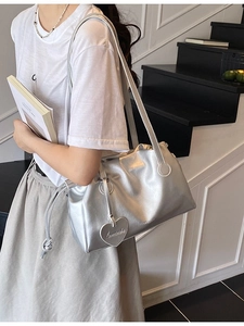 Metallic silver pleated hobo shoulder bag with heart charm and minimalist cloud design
