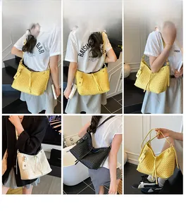 Detail of woven texture tote bags in yellow, white, and black with fringe charms