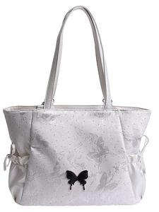 Minimalist cream tote bag with butterfly embossing and black metal butterfly clasp detail