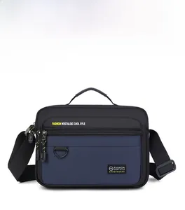 Close-up of durable Oxford fabric texture and front zipper compartment of the blue crossbody bag