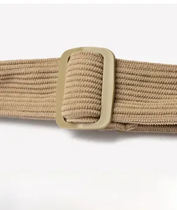 Close-up of khaki corduroy shoulder strap with adjustable square buckle detail