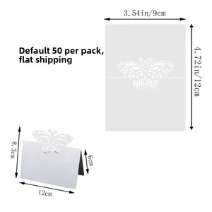 Detailed view of 50 laser-cut white butterfly place cards with flat-pack size dimensions