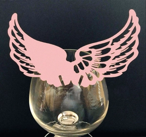 Pink hollow angel wing place cards for wine glass decoration at wedding parties