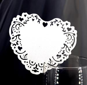 Elegant laser-cut white heart paper cup card with floral hollow pattern for wedding