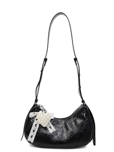 Elegant black patent leather crescent bag with lace bow and pearl charm detail