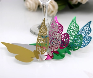 Detailed laser-cut 3D butterfly wall stickers and glass cards in various metallic colors