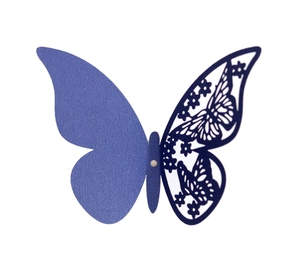 Detail of laser-cut butterfly card featuring intricate floral hollow patterns and white bead