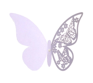 Detail of lavender paper butterfly with laser cut floral patterns and glitter finish