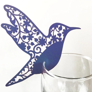 Laser-cut blue hummingbird wine glass card with intricate floral hollow details