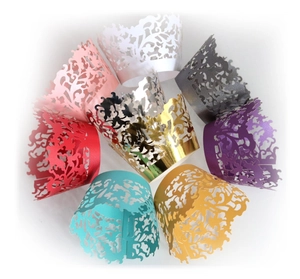 Elegant laser-cut lace cupcake wrappers in multiple vibrant colors with floral vine patterns