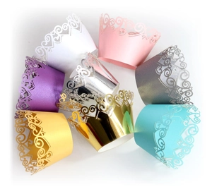 Laser cut heart cupcake wrappers in assorted pearlescent colors for wedding decorations