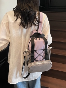 Fashionable lavender and taupe mini backpack with adjustable straps and kmd one logo