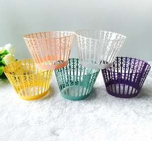 Lace hollow laser-cut cake wrappers in yellow, pink, white, green, and purple