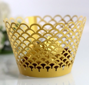 Golden laser-cut fish scale cupcake wrapper with luxury metallic finish for wedding decor