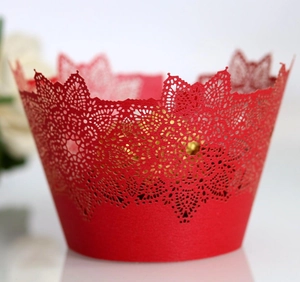 Elegant red laser-cut cupcake wrapper with hollow lace flower pattern for decoration