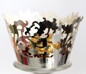 Elegant laser cut silver lace cupcake wrapper with vine patterns for party decoration
