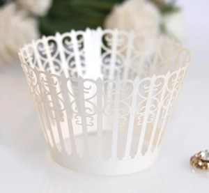 Detailed laser-cut heart pattern cupcake wrapper for wedding dessert decoration