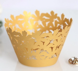 Golden laser-cut cupcake wrappers with maple leaf hollow design for bakery decoration