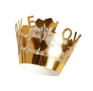Golden lace cupcake wrapper with LOVE cutout and intricate honeycomb hollow patterns