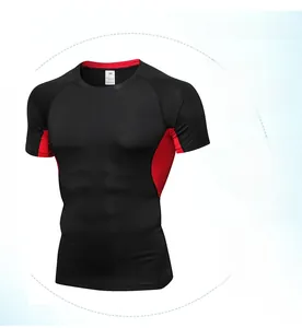 Detail of men's quick-dry compression shirt with red side stitching and size M label