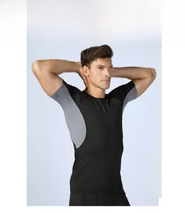 Detail of men's compression shirt with quick-dry fabric and breathable mesh panels