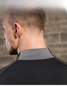 Close-up of men's thermal turtleneck sport top with contrast grey collar and flat seams