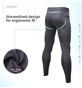 Dettaglio dei pantaloni a compressione grigi da uomo con taglio ergonomico e tessuto tecnico