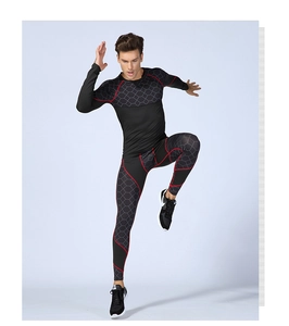 Close-up of men's athletic compression suit showing honeycomb texture and red seam lines