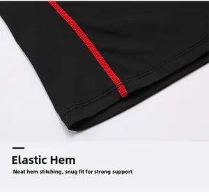 Detail of athletic shirt hem showing elastic dry-fit fabric and red contrast stitching