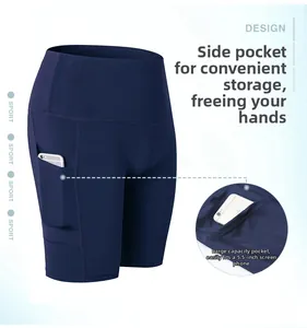 Detail view of high waist yoga shorts with a side pocket holding a smartphone